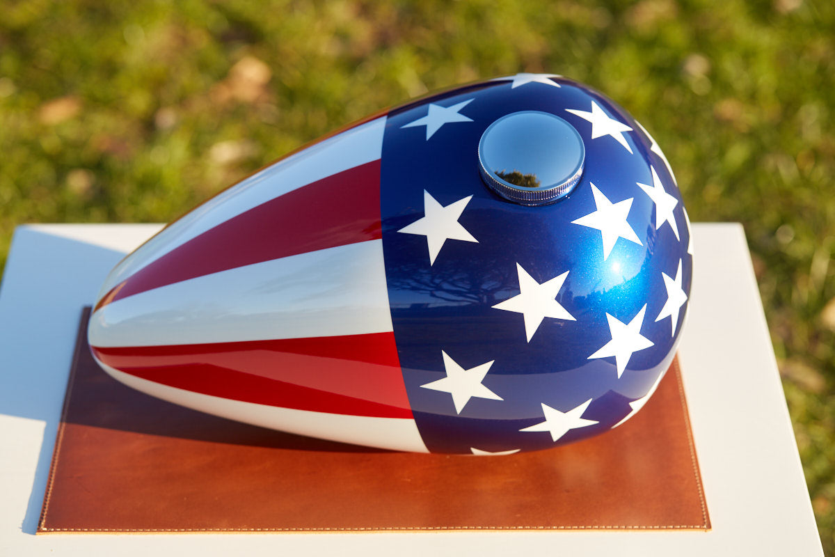 The Freedom cremation urn — from motorcycle gas tank to luxury memorial urn for ashes by HAUS of URNS